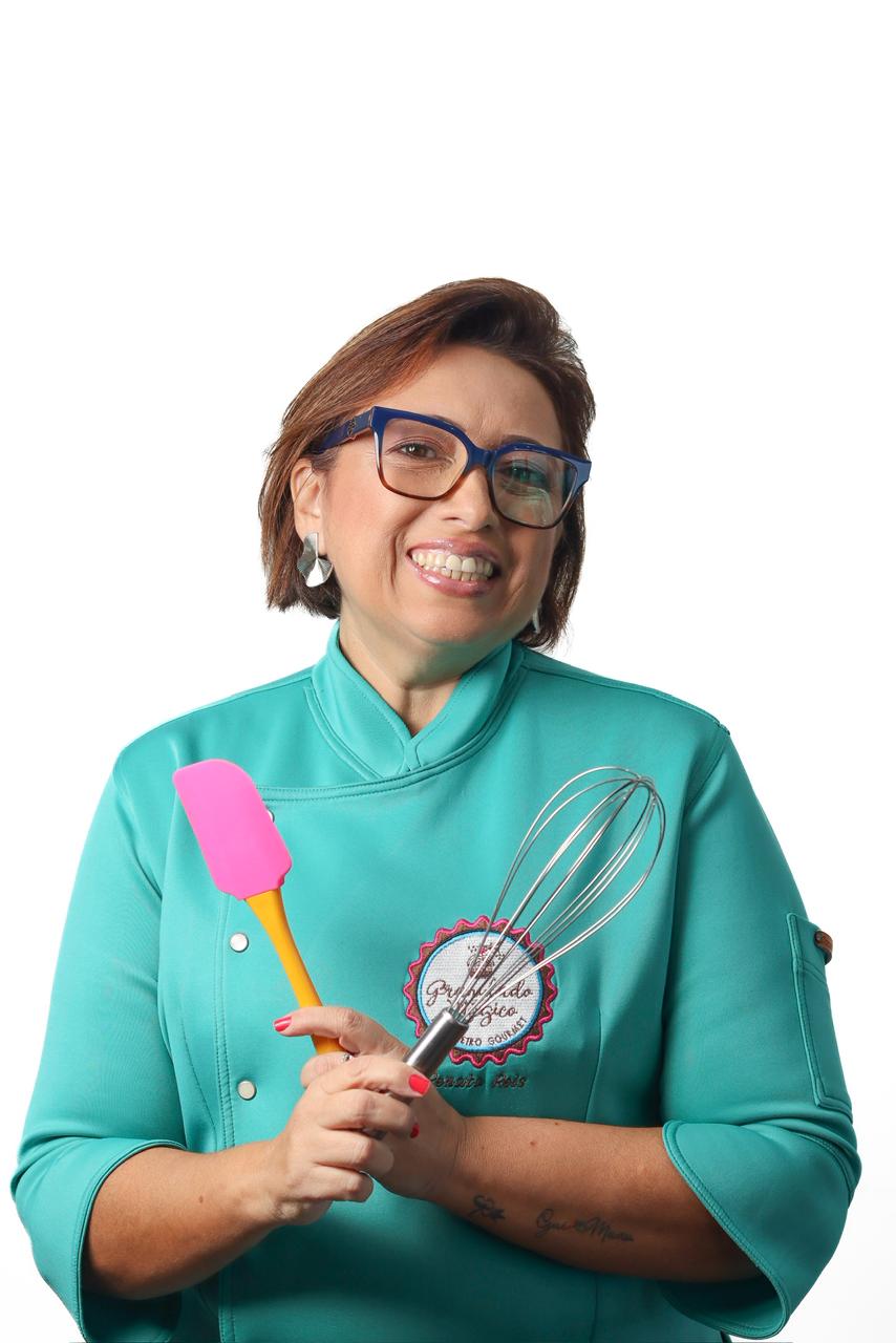 Carrinho gourmet de brigadeiro com toppings em evento elegante